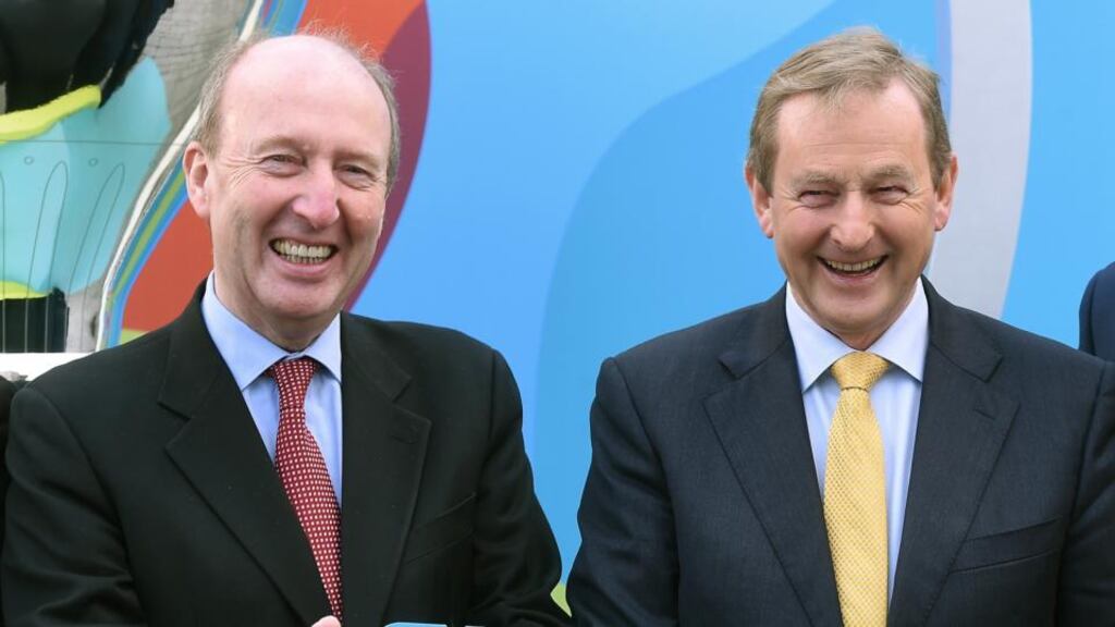 Minister for Transport Shane Ross (left) with Taoiseach Enda Kenny at the launch of the Uefa Euro 2020 Host City Logo launch in Dublin last week. The Minister has confirmed Mr Kenny waved a copy of the Constitution at him during a Cabinet discussion on neutrality. File photograph: David Maher/Sportsfile