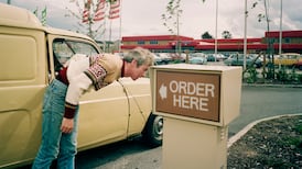 From a garda at prayer to Ireland’s first McDonald’s drive-through: Martin Parr’s revealing photographs of Irish life