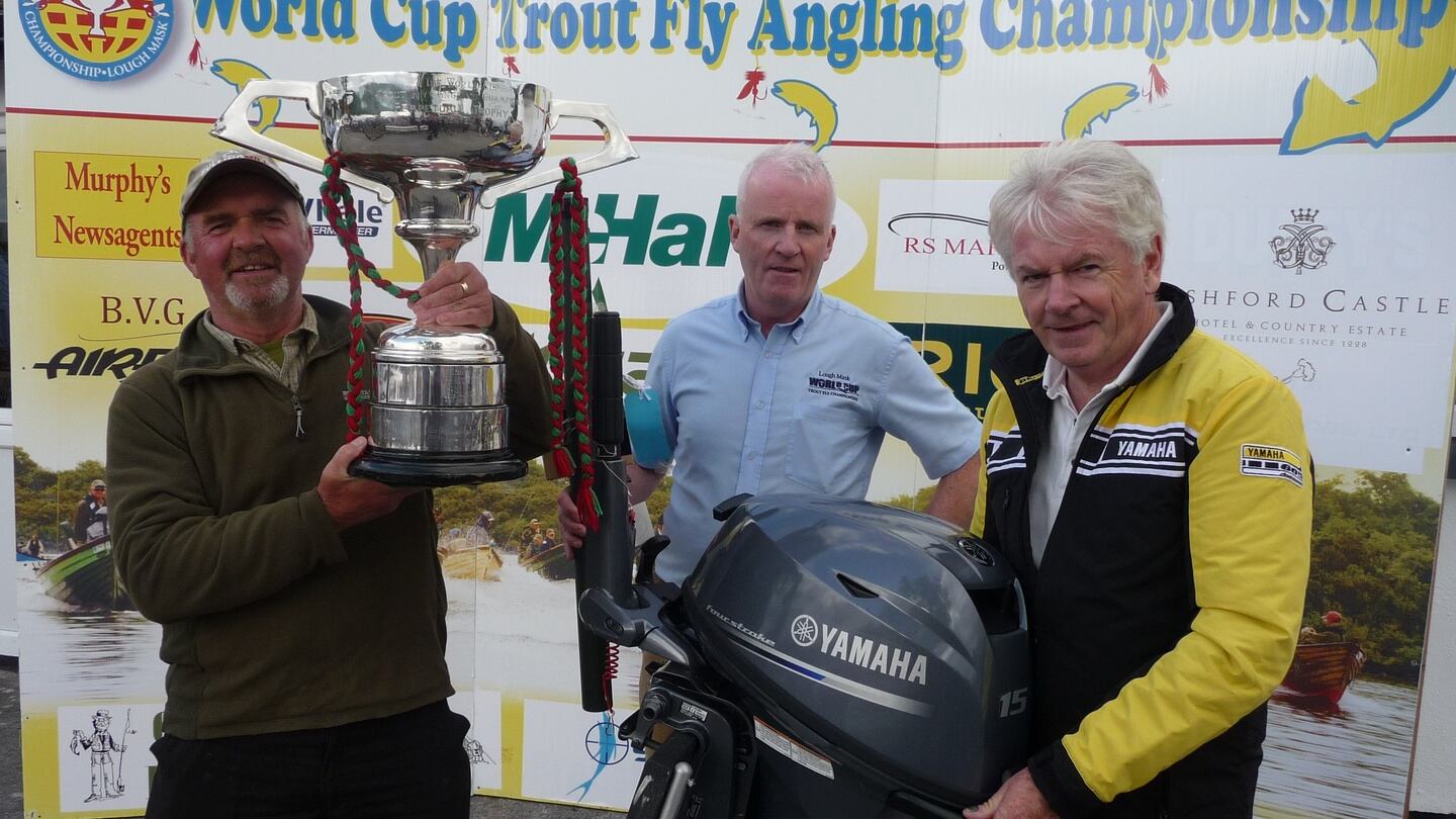 World Cup winner Geoffrey Hylands (left) with chairman Billy Burke and Tom Staunton of RS Marine