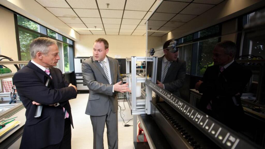 Dr Kieran Curran (right), founder and CEO of Limerick based GenCell Biosystems, with Minister for Jobs, Enterprise  Innovation Richard Bruton.