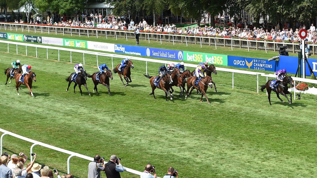 US Navy Flag ridden by Ryan Moore (right) wins the Darley July Cup Stakes  at Newmarket. Photograph:  Joe Giddens/PA Wire