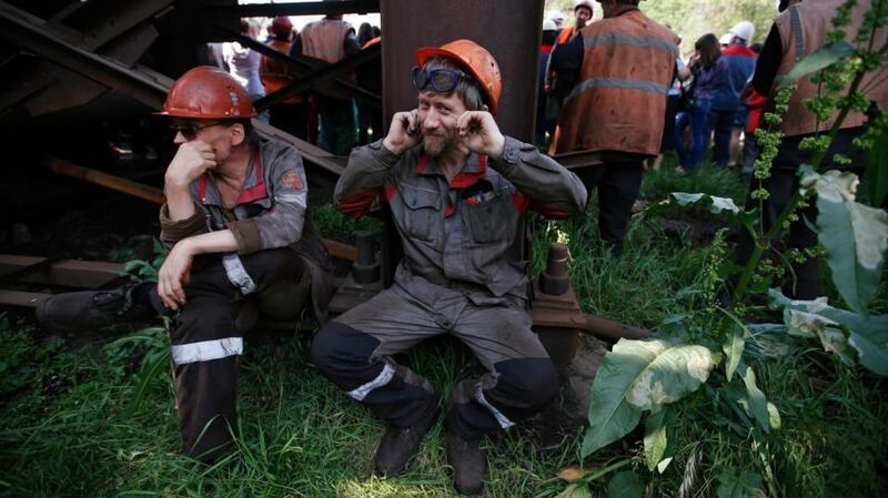 Employees of Azovstal Iron and Steel Works sit during a rally to protest against actions of armed separatists in Mariupol, eastern Ukraine, May 20th, 2014. Factories sounded their sirens in two cities of eastern Ukraine on Tuesday and steel workers held a peace rally in support of a call by Ukraine’s richest man, Rinat Akhmetov, for protests against armed separatists who plan to disrupt a May 25th presidential election. File photograph: Maxim Zmeyev/Reuters