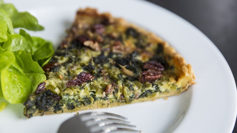Kale, blue cheese, pecan and maple syrup tart. Photograph: Emma Jervis