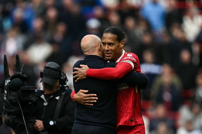 Liverpool's Dutch manager Arne Slot congratulates Dutch defender Virgil van Dijk after Liverpool's 2-1 win over West Ham on April 13th. Photograph: Paul Ellis/AFP via Getty Images