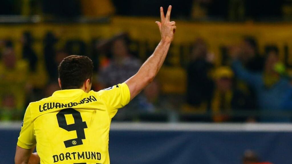 Borussia Dortmund’s Robert Lewandowski celebrates his third goal against Real Madrid. Photograph: Kai Pfaffenbach/Reuters