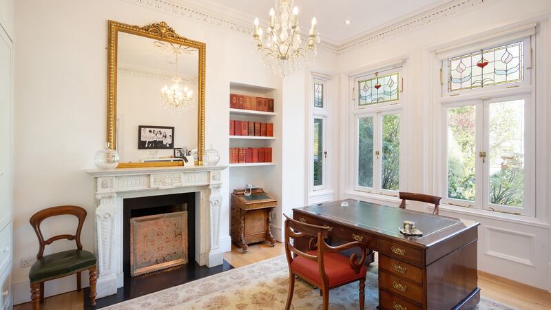 Off the main hall to the left and right are original receptions now used as a study and sitting room