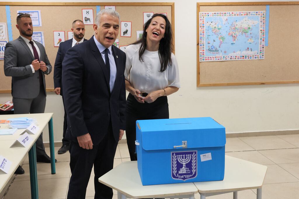 Israeli Prime Minister Yair Lapid with his wife Lihi, pictured after casting his vote at a polling station in Israel's coastal city of Tel Aviv on Tuesday, November 1st. Photograph: Jack Guez/Getty