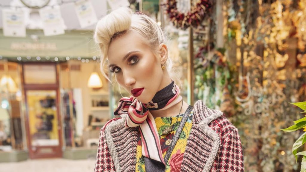 Check coat €250, yellow floral jumper €115, floral print silk scarf €185. All from Monreal, Winthrop Arcade, Cork