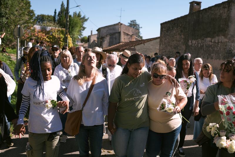 People march in support of Gisèle Pelicotin Mazan. Photograph: Dmitry Kostyukov/New York Times