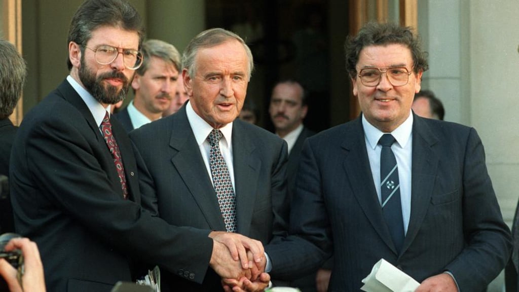 Former taoiseach Albert Reynolds shakes hands with Sinn Féin’s Gerry Adams and SDLP’s John Hume outside Government Buildings in September 1994. Photograph: Matt Kavanagh