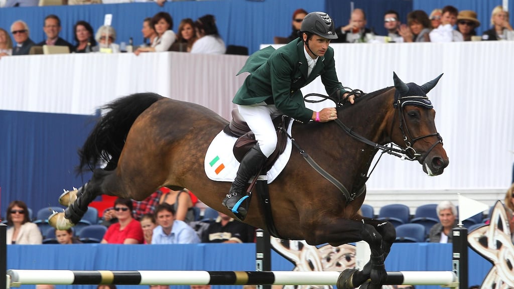 Denis Lynch was one of the Irish riders who dominated the Puissance competition in Liverpool. Photograph: Inpho