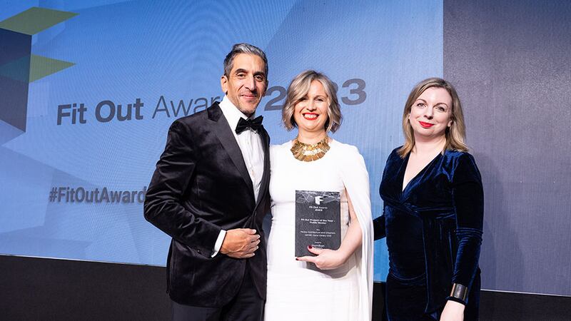 Eoghan Kennedy, business development manager at Hamilton Robson, presents fit out project of the year – public sector award to Lisa Smyth and Alison Ahern, Reddy Architecture and Urbanism