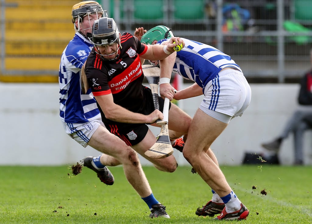 Mount Leinster Rangers' Richard Coady and Jack Sheridan of Naas. Photograph: Lorraine O’Sullivan/INPHO