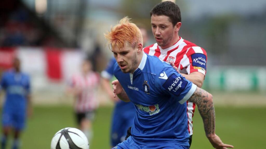 Limerick’s Steve Folan and Derry’s Rory Patterson at the Brandywell. Photograph: Lorcan Doherty/Presseye/Inpho