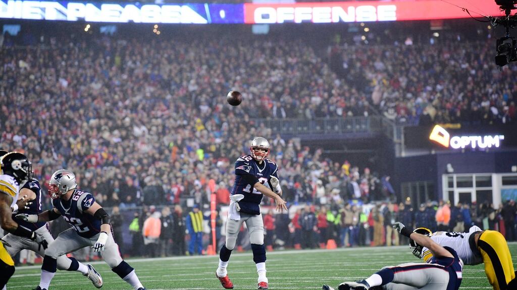 New England Patriots quarterback Tom Brady throws a pass against the Pittsburgh Steelers last month. Photograph: John Cetrino/EPA