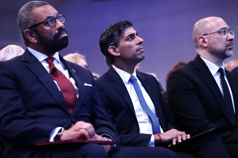 UK prime minister Rishi Sunak sits between foreign secretary James Cleverly and Ukrainian prime minister Denys Shmyhal on the first day of the Ukraine Recovery Conference. Photograph: Henry Nicholls/WPA Pool/Getty