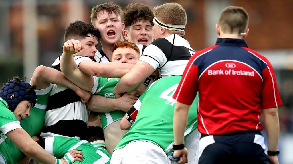 Gonzaga’s Brian O’Donnell is held up by the Belvedere defence during the  Bank of Ireland Leinster Senior Cup first-round game at  Donnybrook Stadium. Photograph: Ryan Byrne/Inpho