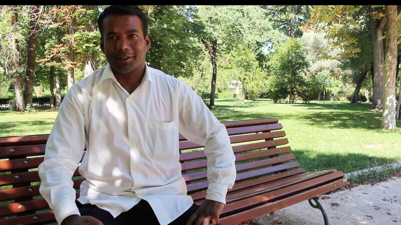 Hashem, a former Bangladeshi politician, sells beer on the street to revellers.