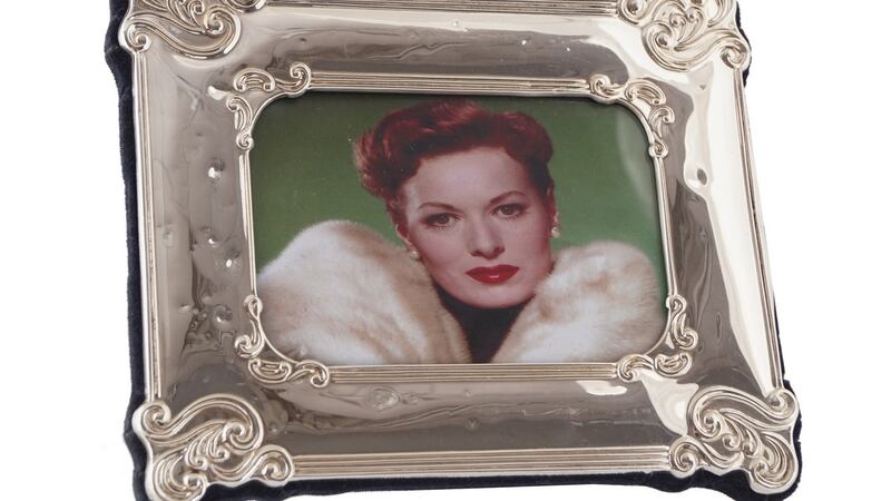 Framed photograph of Maureen O’Hara wearing her Dior white mink made €380