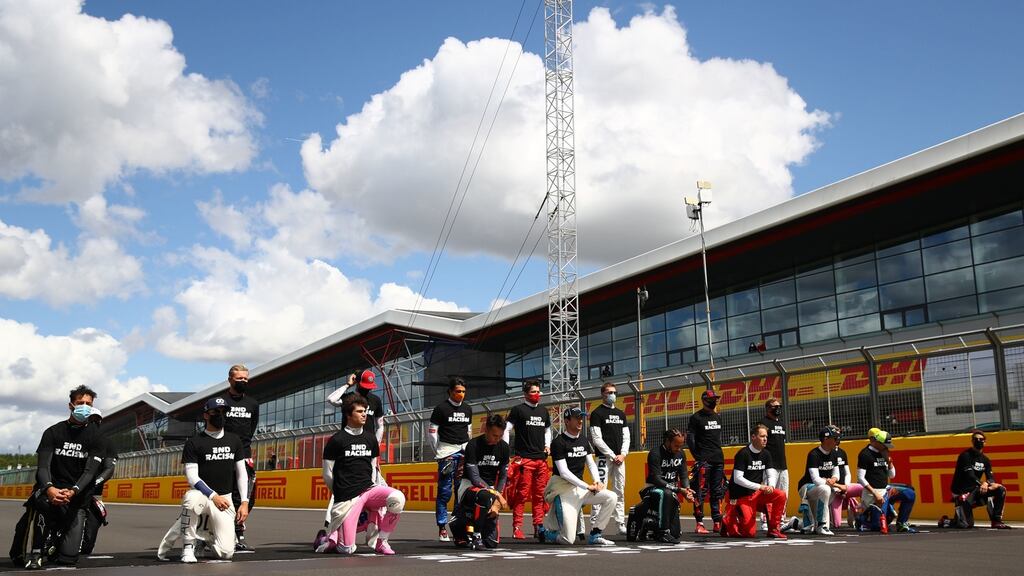 Lewis Hamilton and his fellow drivers look set to be allowed to take the knee again this season after Formula One revealed it will continue to include a moment of reflection ahead of races. Photograph: FIA Pool/PA Wire