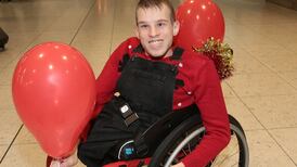 Wheelchair surprise adds to Chernobyl children’s Christmas joy