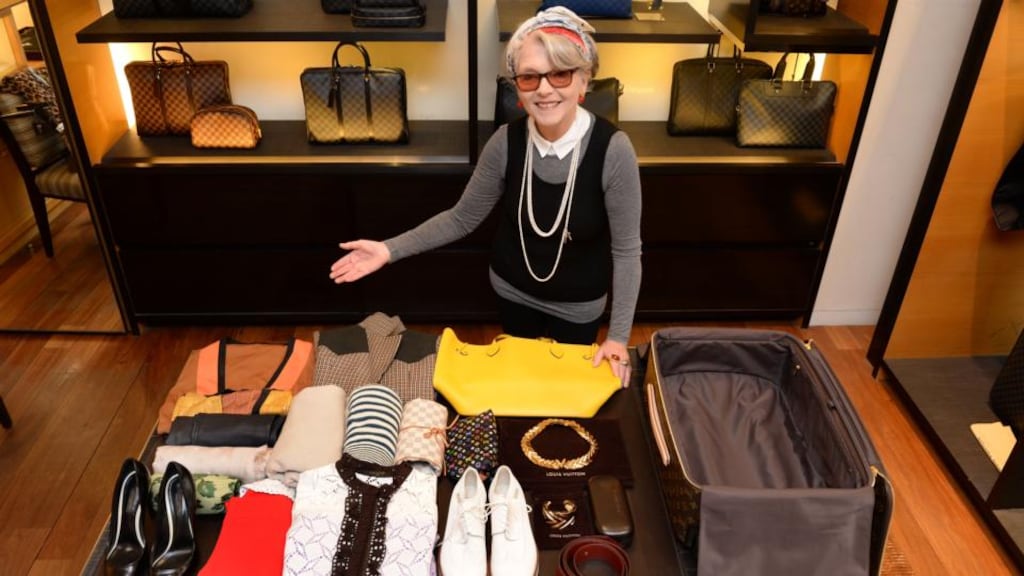 Folding not fretting: Deirdre McQuillan learning the art of packing at Louis Vuitton’s London branch. Photograph: Dara Mac Donaill