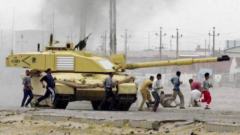 Britain’s 2 Company Irish Guards are seen in Basra, Iraq, in 2003. Photograph: Mirrorpix/ Getty Images
