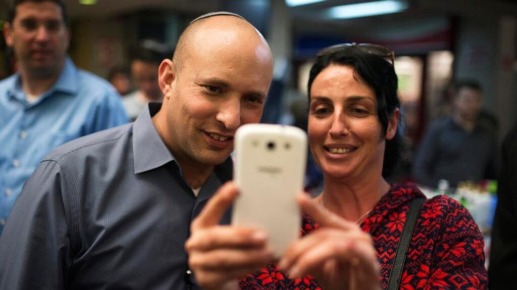 Israel’s economy minister Naftali Bennett, head of the far-right Jewish Home party, during campaigning in the country’s general election. Photograph: Amir Cohen/Reuters