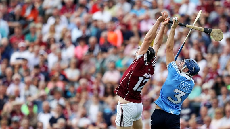 Eoghan O’Donnell of Dublin takes a catch above Galway’s Joseph Cooney during the Leinster senior hurling championship quarter-final at O’Connor Park, Tullamore. Photograph: Tommy Dickson/Inpho