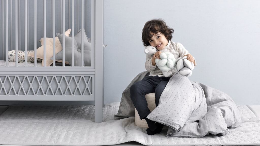 Baby Ventura cot:  In a post-gender society it is hard to believe that the colour-coding of pink for girls and blue for boys was once the reverse