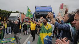 Bolsonaro complains of election ‘injustices’ in Brazil, but transition to Lula will begin