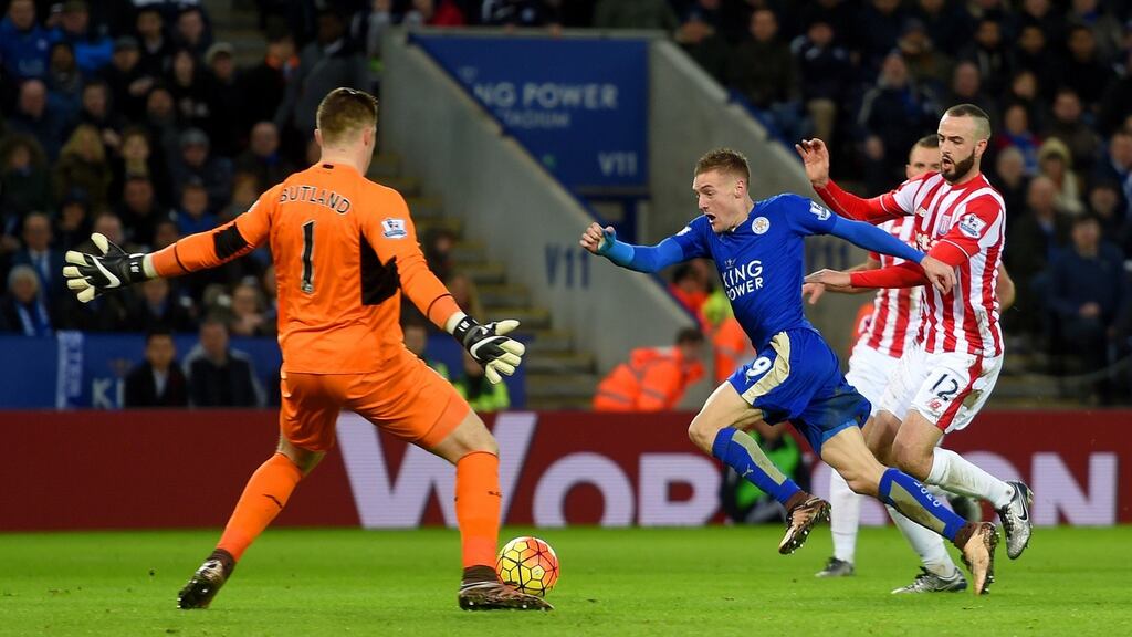 Jamie Vardy rounds Jack Butland to score Leicester City’s second in their 3-0 win over Stoke. Photograph: Getty
