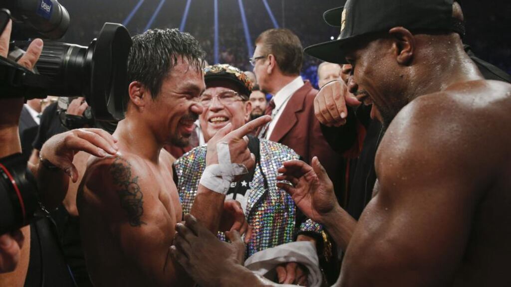 Floyd Mayweather has said he will fight Many Pacquiao again next year after the Filipino has recovered from shoulder surgery. Photograph: Epa