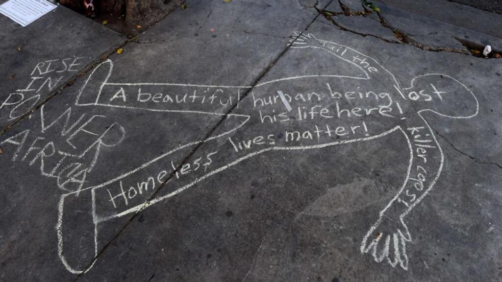 A chalk outline drawn by supporters shows where the homeless man known as ‘Africa’ was recently shot dead during a scuffle with police in Los Angeles, California. Photograph: Mark Ralston/AFP/Getty Images