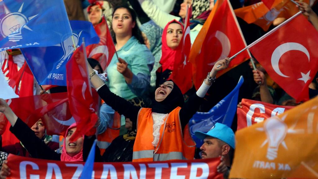 Supporters with AK Party flags and Turkey national flags at the extraordinary congress where Binali Yildirim was appointed head of Turkey’s ruling party. Photograph: Adem Altan/AFP/Getty Images