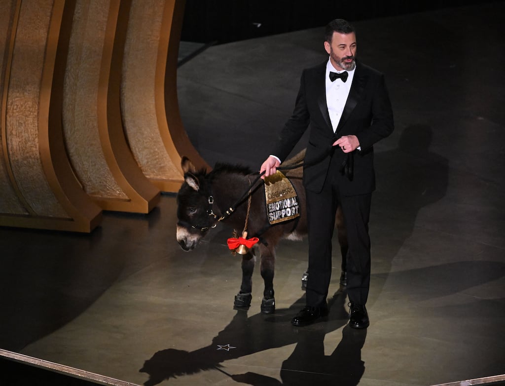 Jimmy Kimmel onstage with a donkey during the 95th Annual Academy Awards at the Dolby Theatre in Hollywood, California. Photograph: Patrick T Fallon/Getty Images
