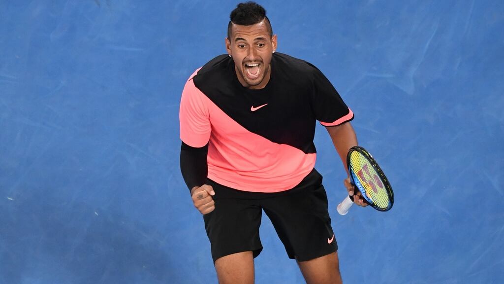 Nick Kyrgios of Australia celebrates winning his third round match against Jo-Wilfried Tsonga of France at the Australian Open. Photo: Julian Smith/EPA