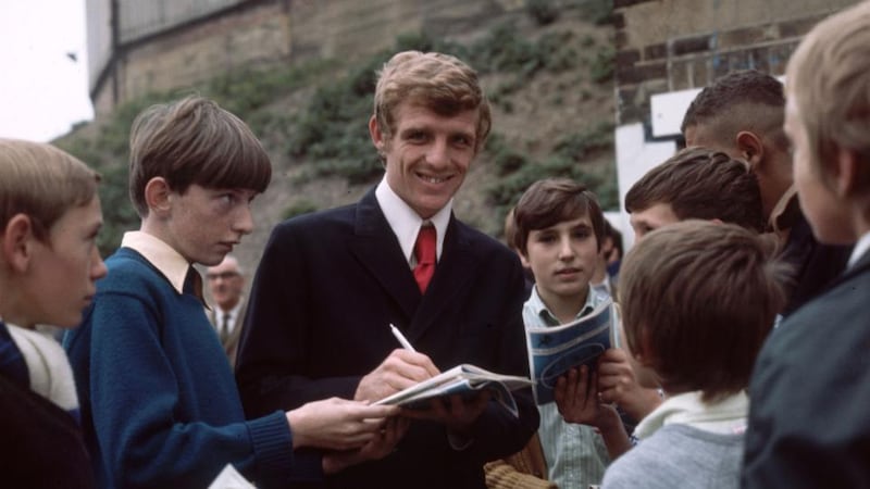 Football fans: Eamon Dunphy signs autographs outside Millwall FC around 1970. Photograph: Express/Getty
