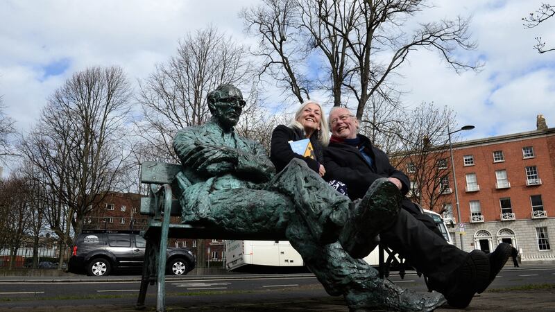 Paula Meehan and Brendan Kennelly beside the statue of Patrick Kavanagh in 2014. Photograph: Dara Mac Dónaill