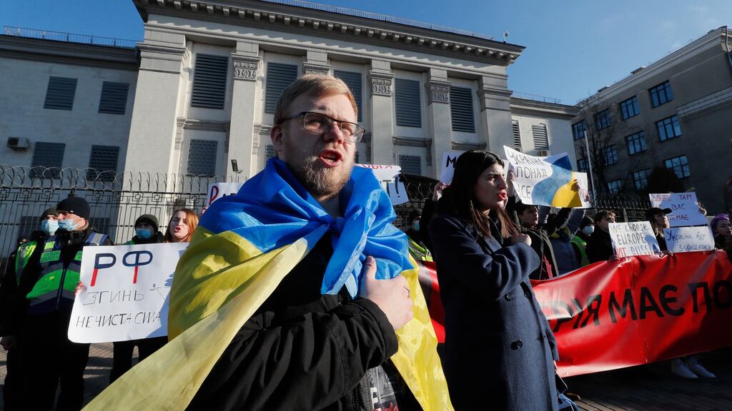 Ukrainians protest in front of the Russian embassy in Kyiv on Tuesday. Photograph: Sergey Dolzhenko/EPA-EFE