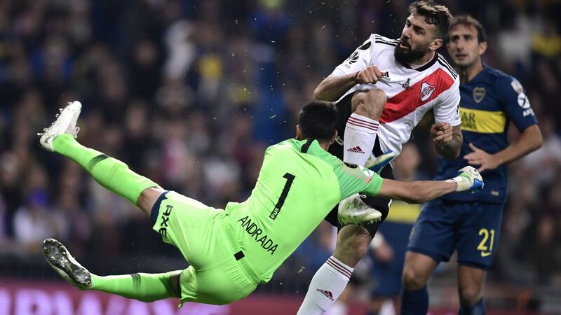 River Plate’s Lucas Pratto collides with Boca Juniors’ goalkeeper Esteban Andrada. Photo: Javier Sorriano/Getty Images