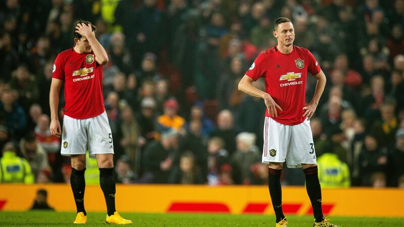 Harry Maguire and Nemanja Matic react after going 2-0 down. Photo: Peter Powell/EPA