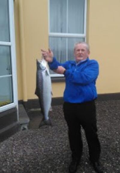 Local angler Kevin O’Shea with first salmon of 2020 in Ireland, caught in Butler’s Pool, Waterville, Co Kerry. Photograph: Vincent Appelby