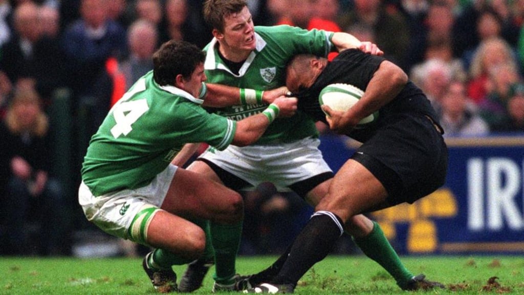 Jonah Lomu of New Zealand is tackled by Shane Horgan and Brian O’Driscoll of Ireland at Lansdowne Road in 2001. Photograph: Patrick Bolger/Inpho