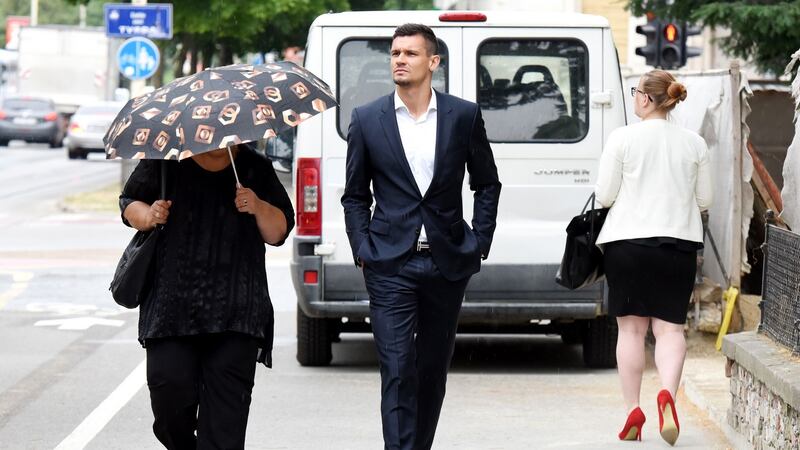 Liverpool defender Dejan Lovren arrives at court. Photo: Getty Images