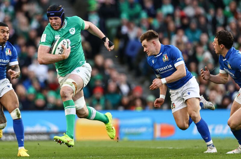 Ireland’s Ryan Baird making a break away from Italy's Stephen Varney at the Aviva Stadium. Photograph: Ben Brady/Inpho