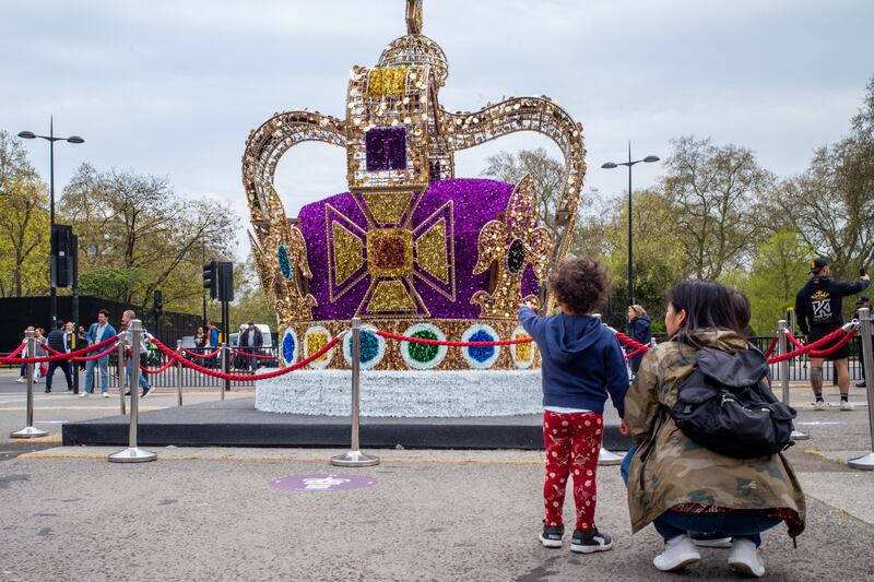 People view a replica of the St Edward's Crown on Thursday in London, England. The Coronation of King Charles III and The Queen Consort will take place on Saturday, part of a three-day celebration. Photograph: Brandon Bell/Getty Images