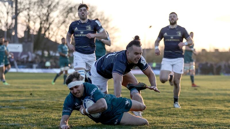 Connacht’s John Porch scores his side’s first try despite the efforts of James Lowe of Leinster in the Heineken Champions Cup Round of 16 First Leg, at the Sportsground, Galway. Photograph: Dan Sheridan/Inpho