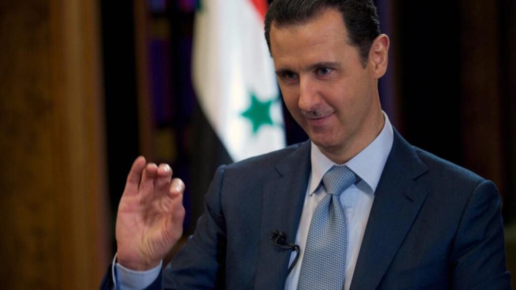 Syrian President Bashar al-Assad  gives an interview to the BBC  in Damascus on Tuesday. Mr Assad said in an interview that Damascus receives “information” about air strikes by the US-led coalition against the Islamic State group in Syria. Photograph: AFP