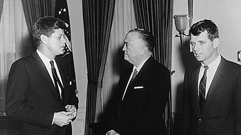 Pictured in 1961, then US president John F Kennedy, FBI director J. Edgar Hoover, and attorney general Robert F. Kennedy in the Oval Office. Photograph: AFP Photo/National Archives